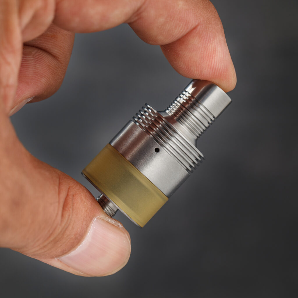 Hybrid part combining machined metal and ULTEM®.